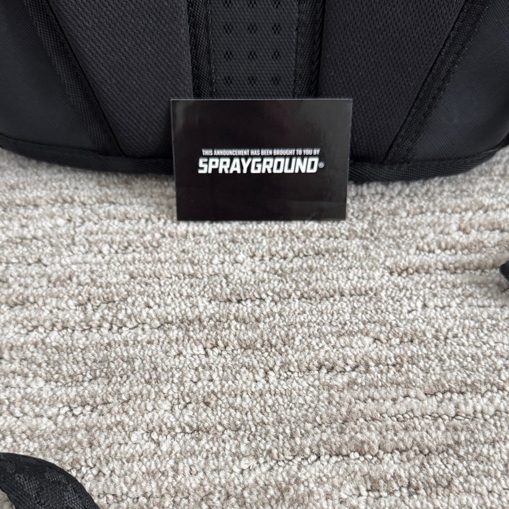 Sprayground Black Backpack with Vibrant Red Interior - Picture 5 of 6